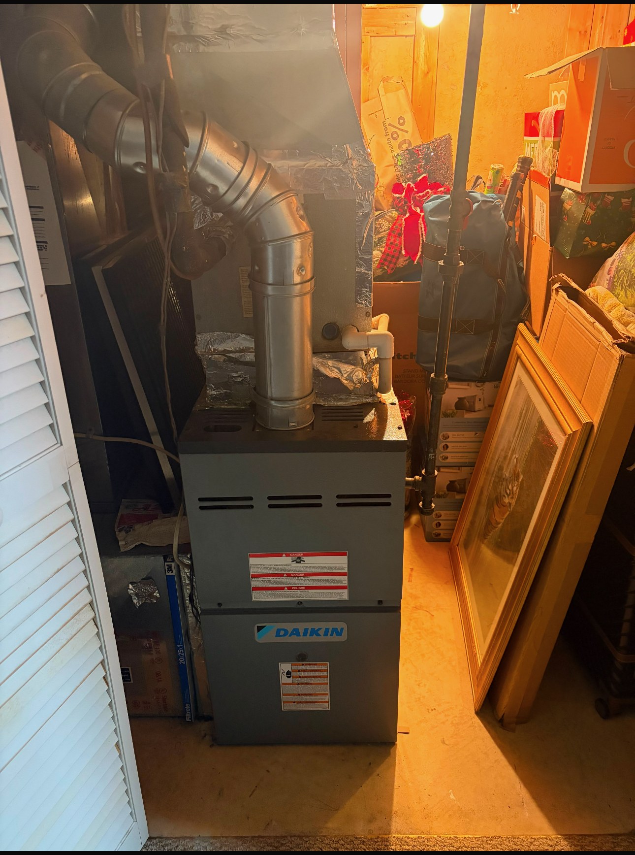 Indoor HVAC furnace setup before replacement
